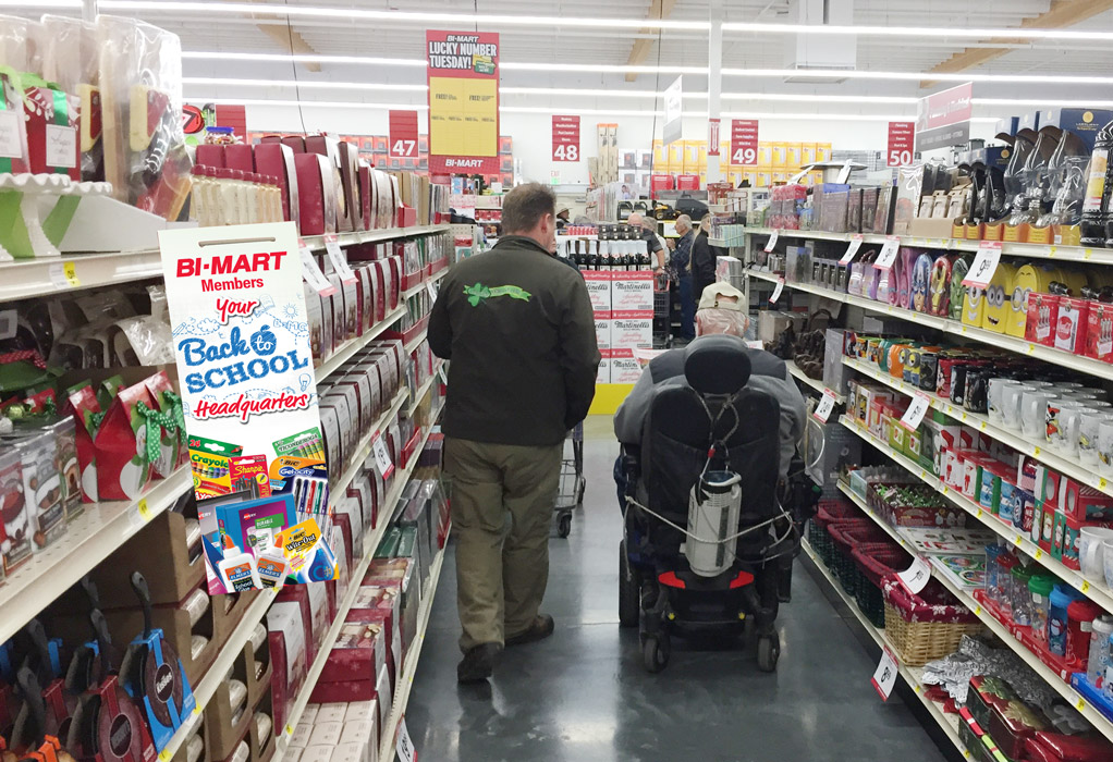 Shelf talker hanging in aisle